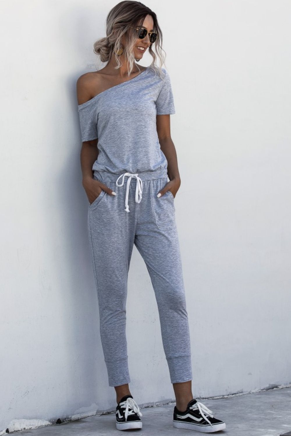 Asymmetrical Neck Tied Jumpsuit with Pockets